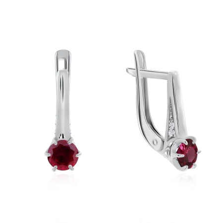 Серьги из серебра с корундом со скидкой