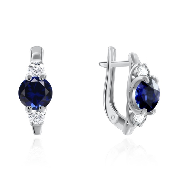 Серьги из серебра с корундом со скидкой