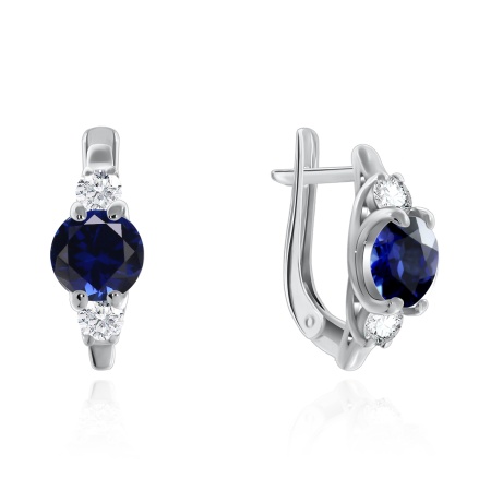 Серьги из серебра с корундом со скидкой