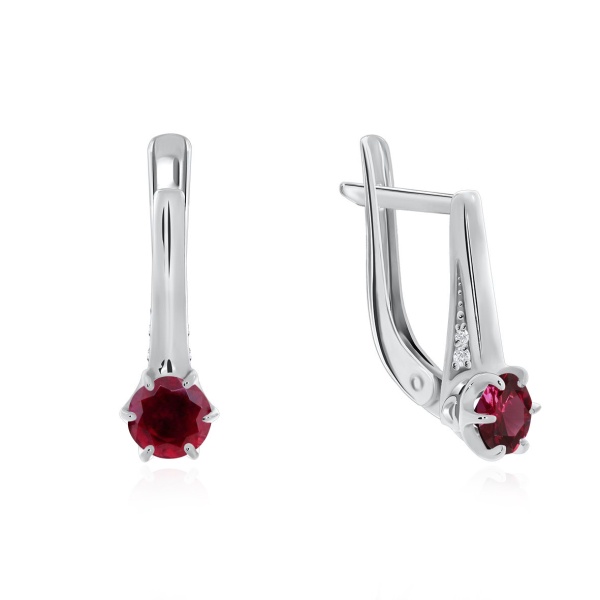 Серьги из серебра с корундом со скидкой