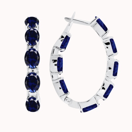 Серьги из серебра с корундом