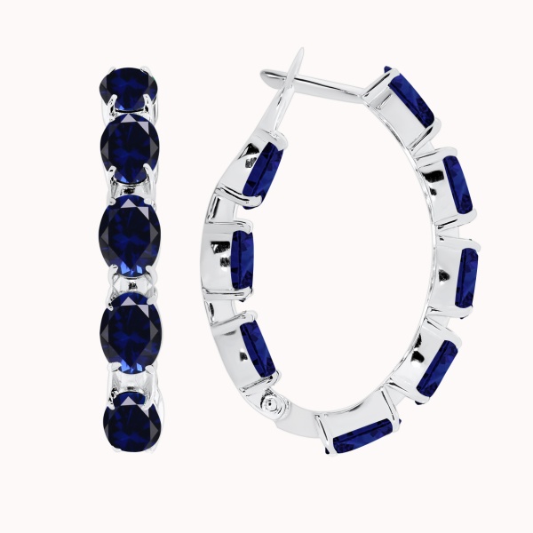 Серьги из серебра с корундом